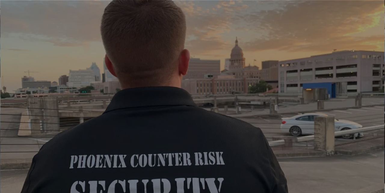 security-officer-standing-with-phoenix-counter-risk-security-jacket